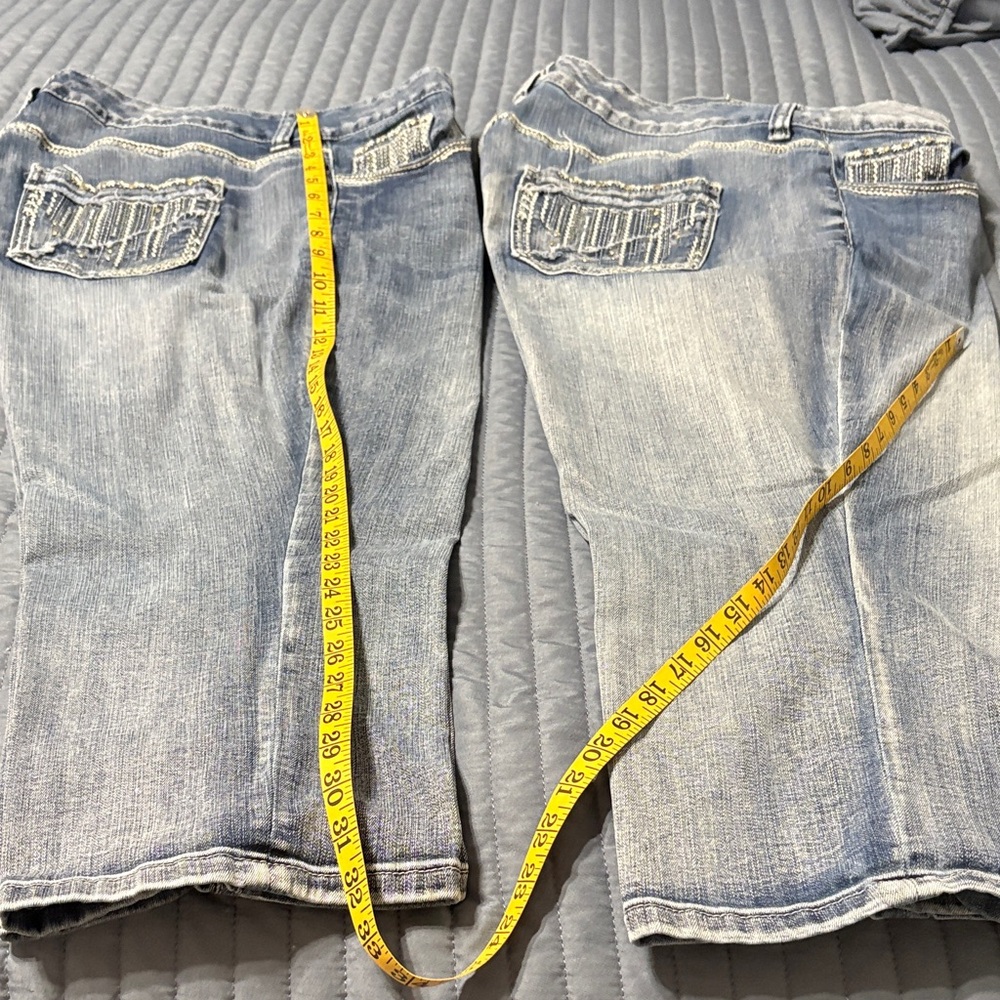 Two (2) pair identical Maurice’s capris, 
Sz 20